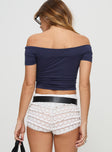 back view of model wearing Princess Polly Serendipia Off The Shoulder Graphic Top Navy Short Sleeves straight 