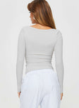 Long sleeve ribbed top with a scooped neckline Good stretch, lined body