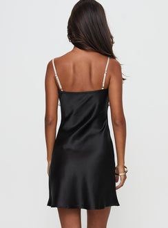 back view of model wearing Princess Polly Cacciatore Mini Dress Black / Cream Sweetheart Neckline 