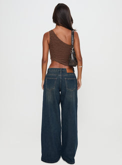 back view of model wearing Princess Polly Low Rise Wide Leg Jean Hocus Pocus Wash Low Rise Jeans 