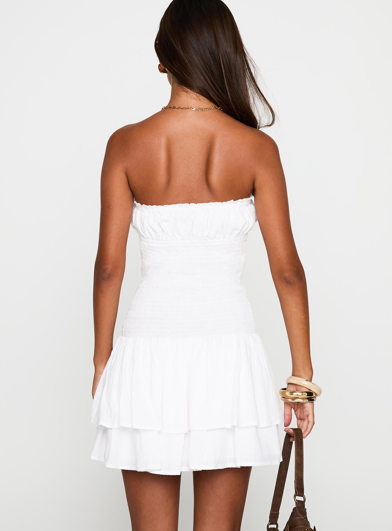 back view of model wearing Princess Polly Delfie Strapless Mini Dress White Straight Neck 
