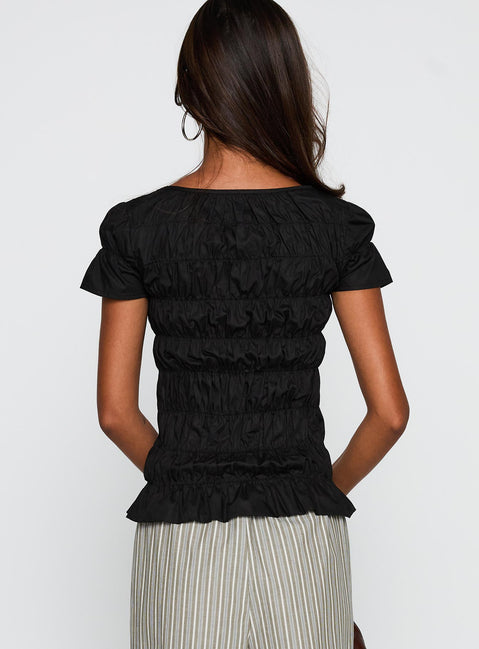 back view of model wearing Princess Polly Spoiler Alert Ruched Top Black Short Sleeves Scoop Neck 