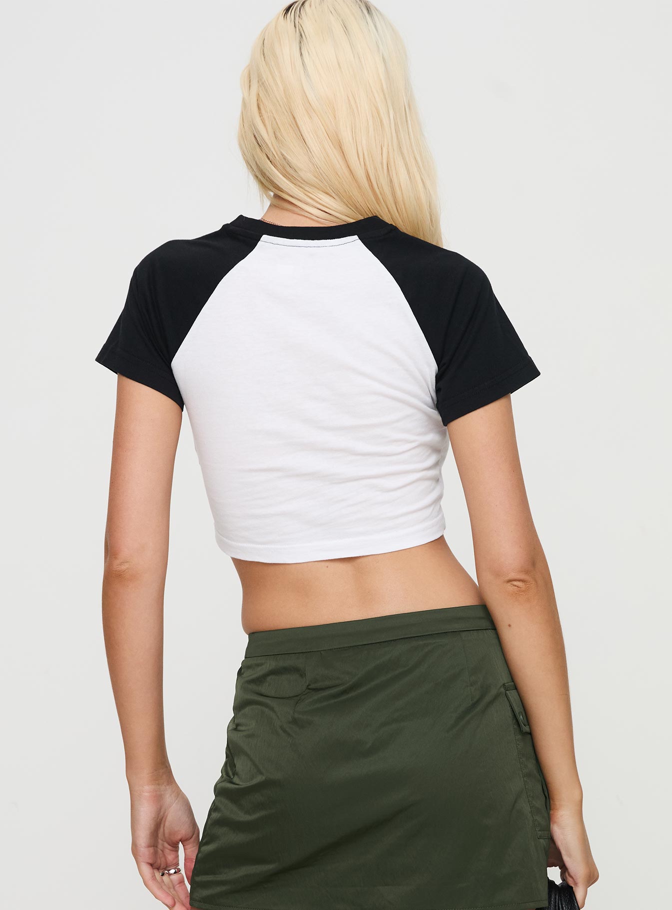 back view of model wearing Princess Polly Lucky Number Top White Short Sleeves Crew Neck 