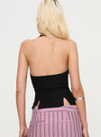 back view of model wearing Princess Polly Childers Halter Top Black Sleeveless Plunger 