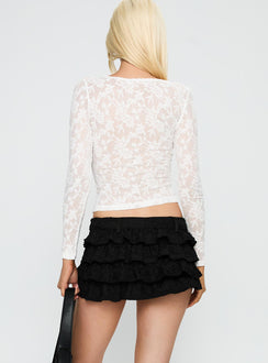 back view of model wearing Princess Polly Match Point Mini Skort Onyx Low Rise Shorts 