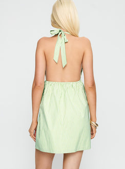 back view of model wearing Princess Polly Estefani Halter Mini Dress Green Stripe Plunger 
