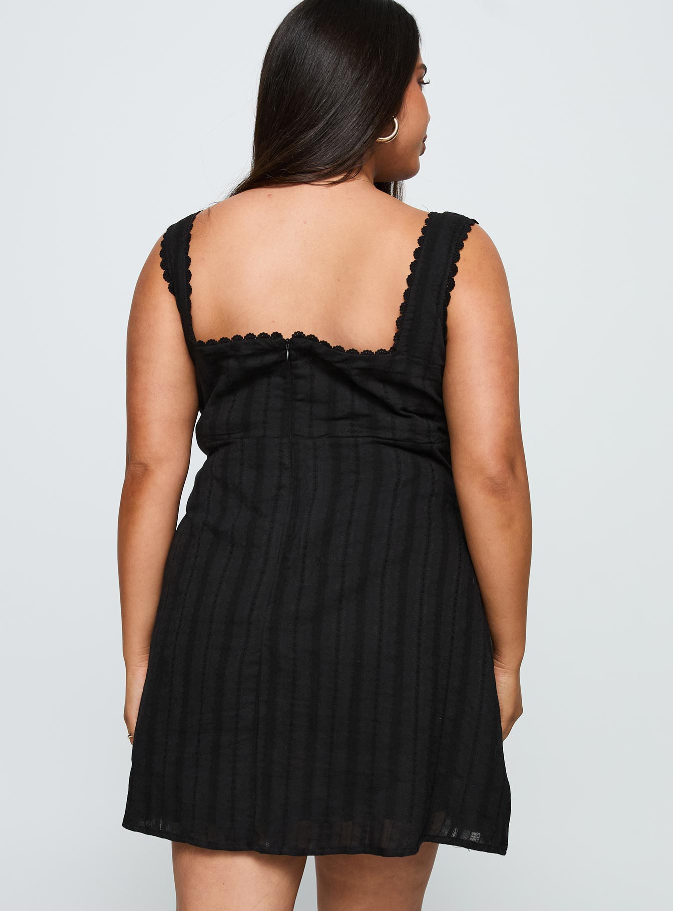 back view of model wearing Princess Polly Dasha Mini Dress Black Curve Square Neck 