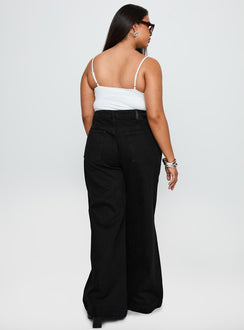 back view of model wearing Princess Polly Goldie High Wide Jean True Black Curve High Waisted 