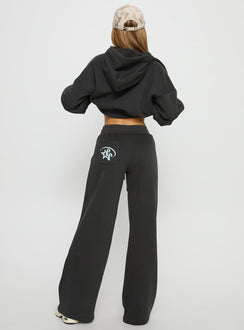 back view of model wearing Princess Polly Princess Polly Stargirl Wide Leg Sweat Pants Charcoal High Rise Pants 