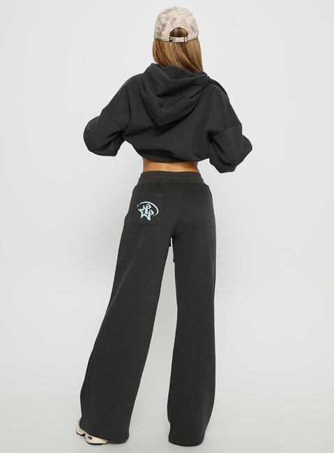 back view of model wearing Princess Polly Princess Polly Stargirl Wide Leg Sweat Pants Charcoal High Rise Pants 