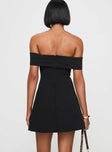 back view of model wearing Princess Polly Lanes Off The Shoulder Mini Dress Black Straight Neck 