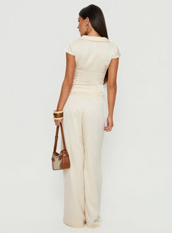 back view of model wearing Princess Polly Aubrette Satin Tie Pants Cream High Rise Pants 