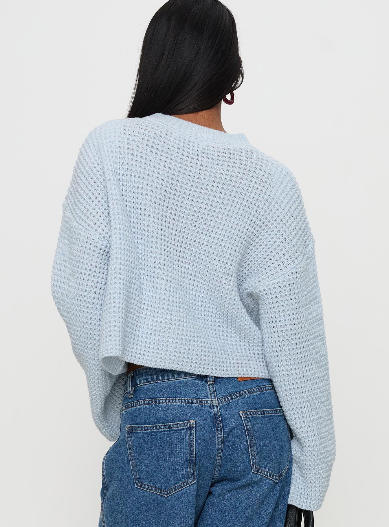 back view of model wearing Princess Polly Elinda Knit Sweater Blue Cropped 