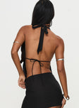 back view of model wearing Princess Polly Quotation Diamante Halter Backless Top Black Sleeveless Plunger 