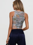 back view of model wearing Princess Polly Couldn't Care Less Graphic Top Leafy Camo Sleeveless Crew Neck 