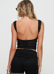 back view of model wearing Princess Polly Catnip Top Black Sleeveless Scoop Neck 