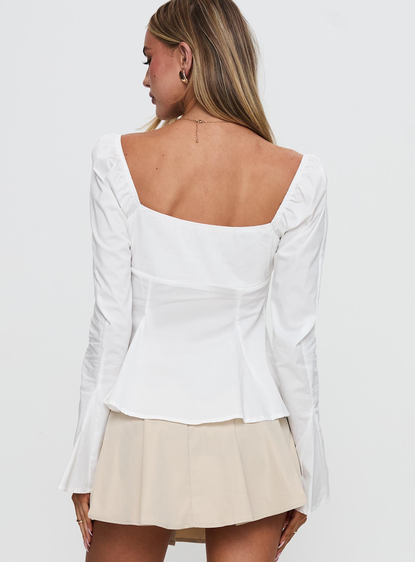 back view of model wearing Princess Polly Lilibette Tie Up Long Sleeve Top White Full Sleeves Square Neck 