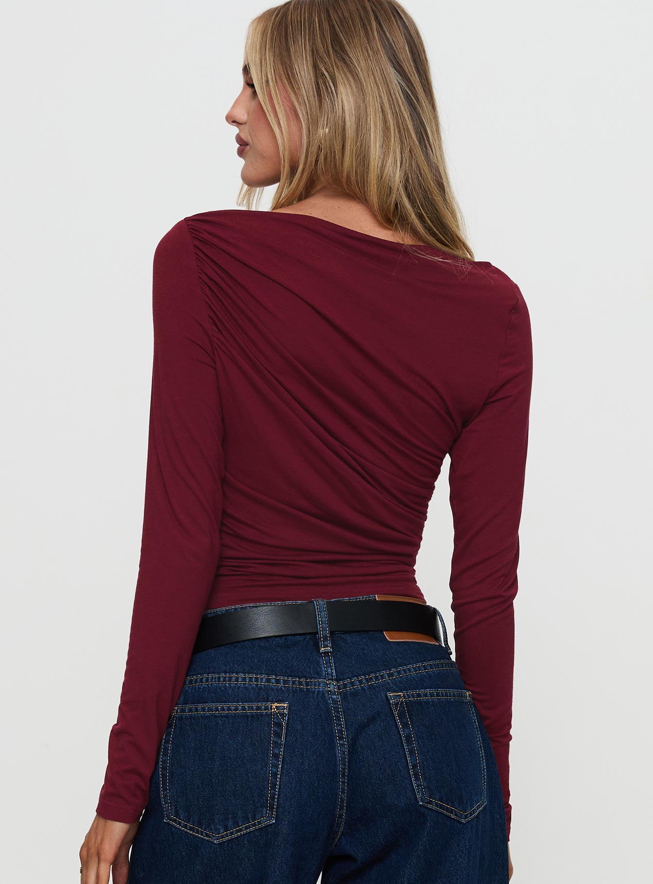back view of model wearing Princess Polly Amberlyn Long Sleeve Ruched Top Burgundy Full Sleeves Boat Neck 