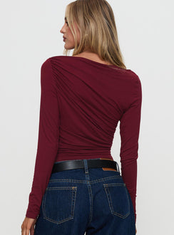 back view of model wearing Princess Polly Amberlyn Long Sleeve Ruched Top Burgundy Full Sleeves Boat Neck 