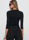 back view of model wearing Princess Polly Giabella 3/4 Sleeve Top Black Full Sleeves Crew Neck 