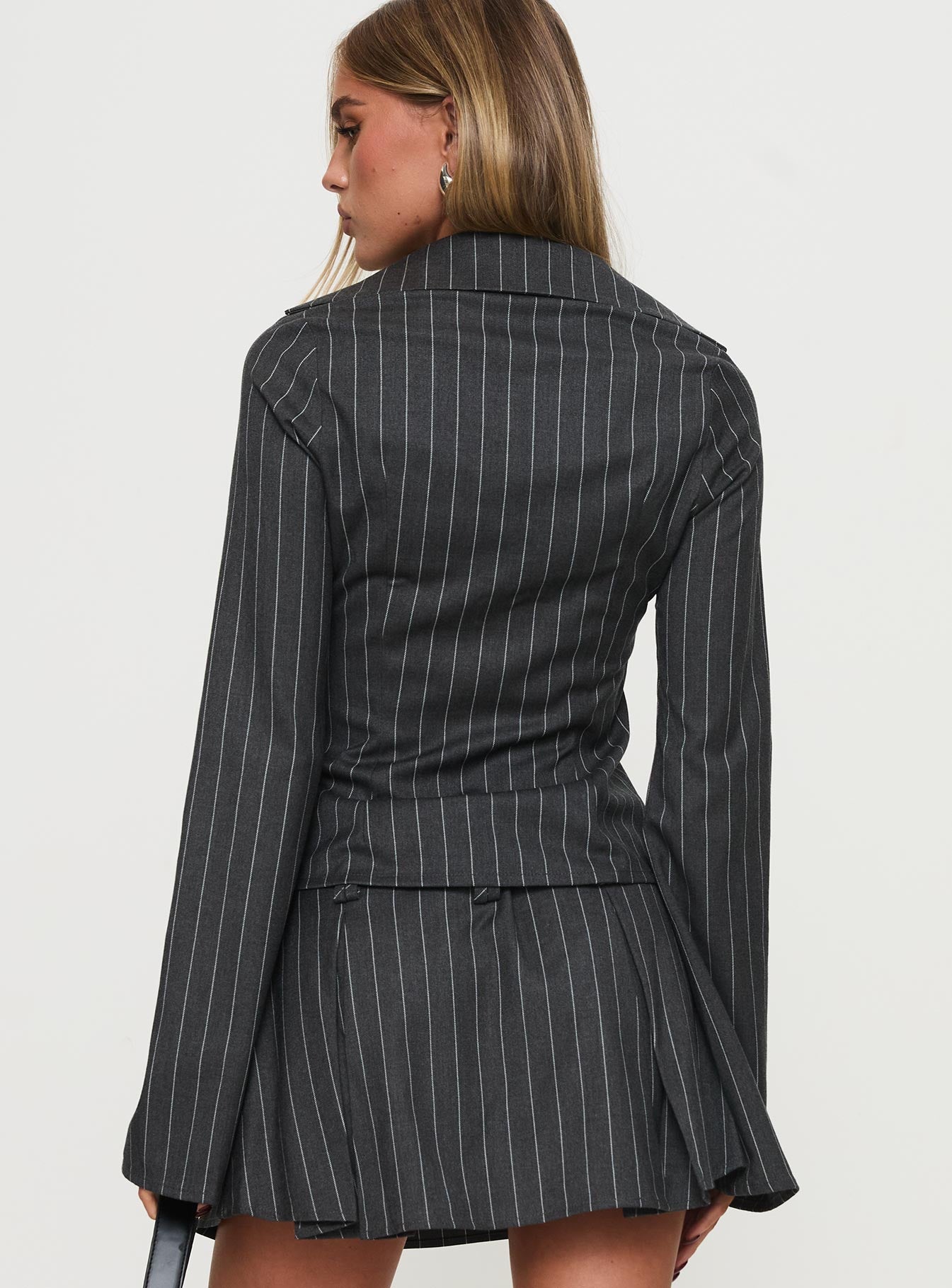 back view of model wearing Princess Polly Saraya Long Sleeve Ring Top Grey Pinstripe Full Sleeves Plunger 