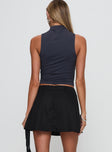 back view of model wearing Princess Polly Barrymore Mini Skort Black Mini Skirts 