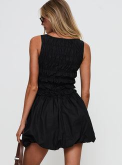 back view of model wearing Princess Polly Demure Shirred Bubble Hem Mini Dress Black Scoop Neck 