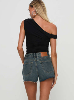 back view of model wearing Princess Polly Get It Right Mid Rise Denim Shorts Dark Denim Wash High Waisted Shorts 