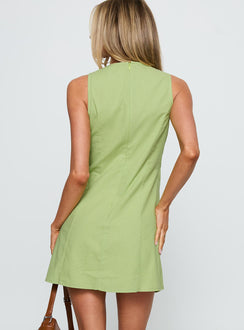 back view of model wearing Princess Polly Kodee Mini Dress Sage V-Neck 