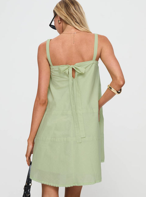 back view of model wearing Princess Polly Jubilant Mini Dress Green Square Neck 