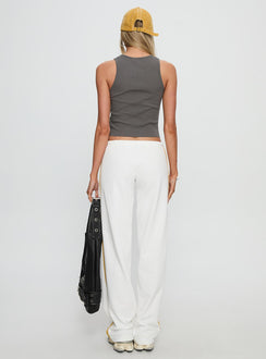 back view of model wearing Princess Polly Elation Low Rise Straight Leg Track Pant White Low Rise Pants 