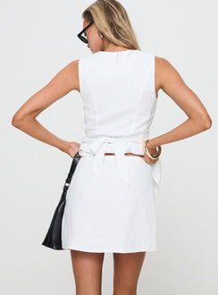 back view of model wearing Princess Polly Springview Mini Skirt White Mini Skirts 