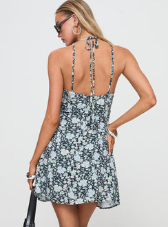 back view of model wearing Princess Polly Fern Mini Dress Black / Blue Floral V-Neck 