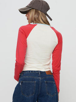 back view of model wearing Princess Polly Racing Star Long Sleeve Top Red Full Sleeves Crew Neck 