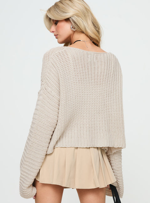 back view of model wearing Princess Polly Artha Cardigan Beige cropped 
