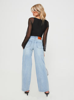 back view of model wearing Princess Polly Maryanne Mid-rise Relaxed Jeans Light Wash High Waisted 