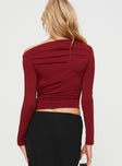 back view of model wearing Princess Polly Matrid Long Sleeve Top Burgundy Full Sleeves Asymmetric Neckline 