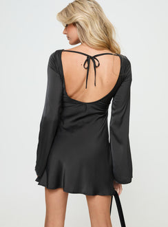 back view of model wearing Princess Polly Lukea Long Sleeve Satin Mini Dress Black 