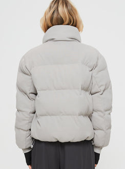 Ribbed puffer jacket High neckline, twin hip pockets, zip fastening down front, drawstring waist, elasticated cuffs