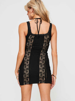 back view of model wearing Princess Polly Sable Mini Dress Black Square Neck 