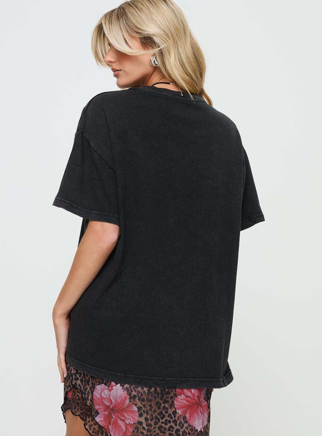 back view of model wearing Princess Polly Electric Vintage Oversized Tee Black Half Sleeves Half Sleeves Crew Neck Crew Neck 