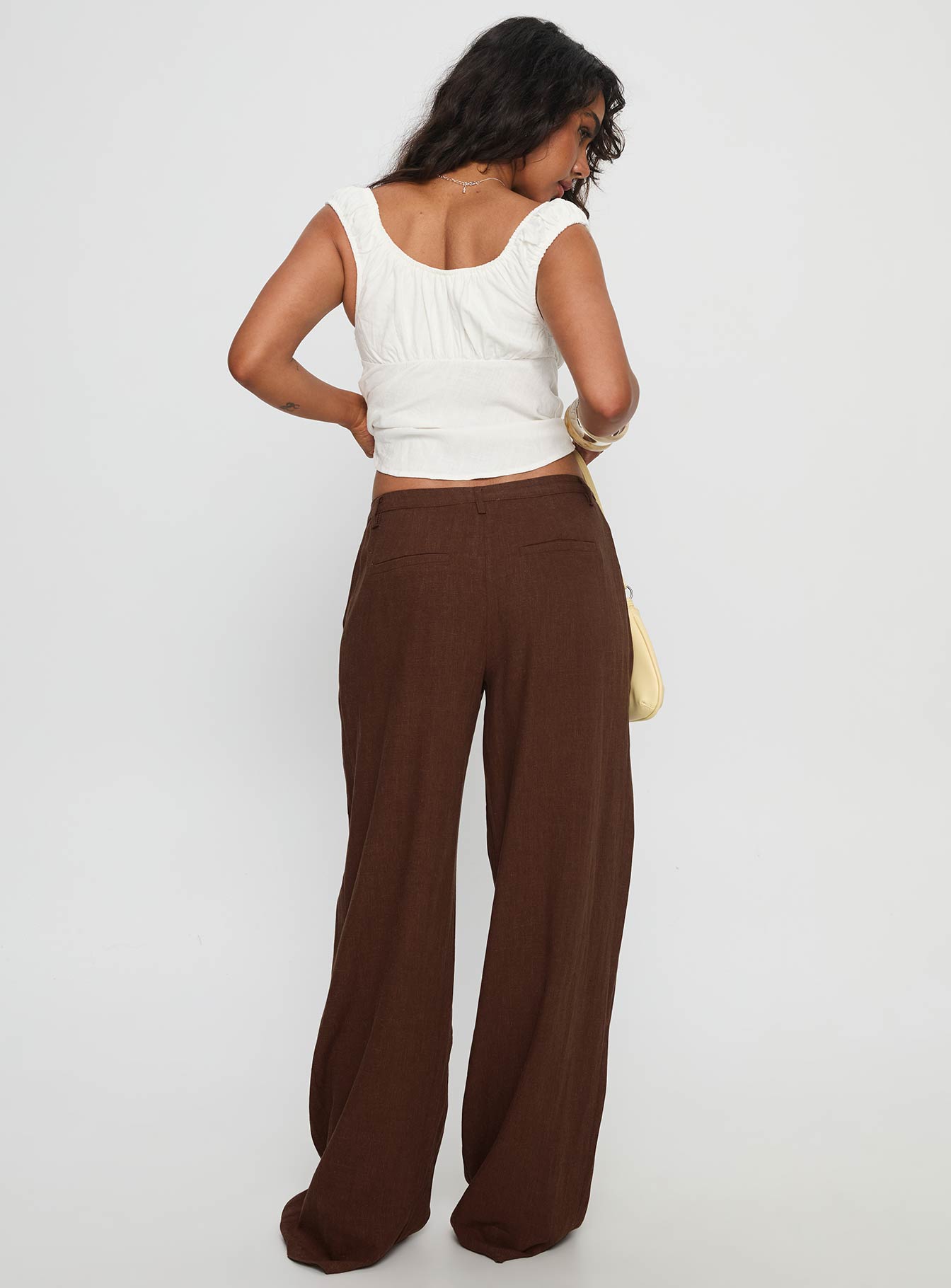 back view of model wearing Princess Polly Vianca Low Rise Linen Pant Chocolate High Waisted Pants 