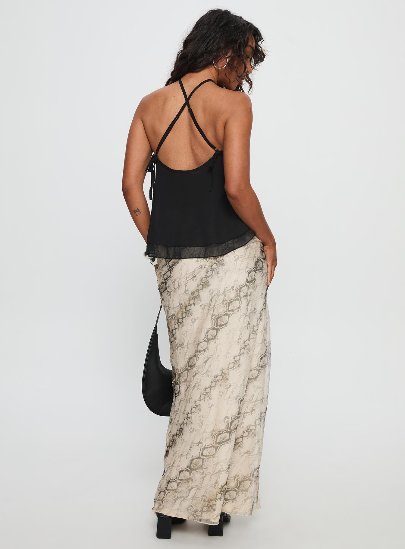 back view of model wearing Princess Polly Zerisa Maxi Skirt Multi Maxi 