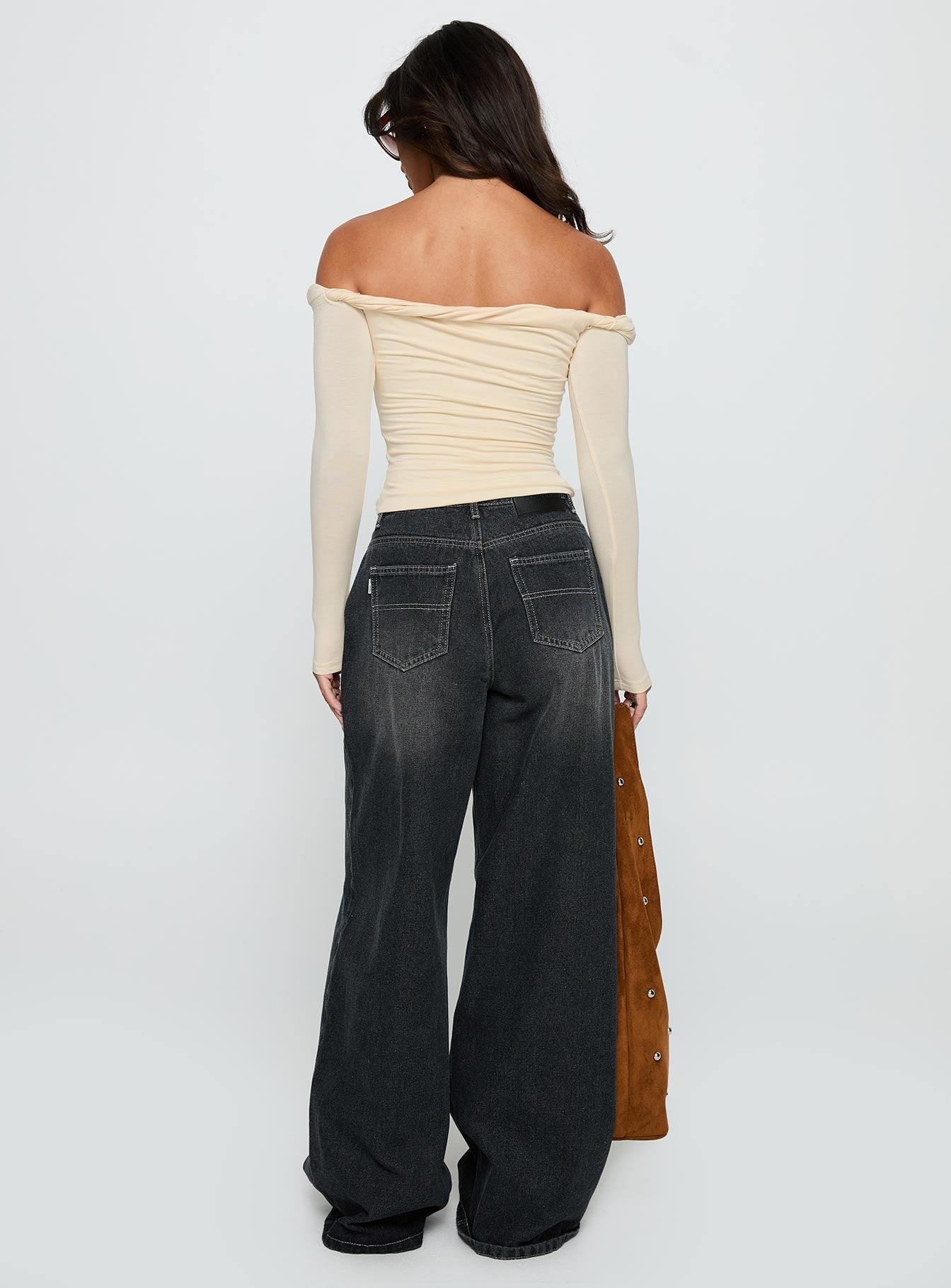 back view of model wearing Princess Polly Naylor Wide Leg Jeans Grey Wash Low Rise Jeans 