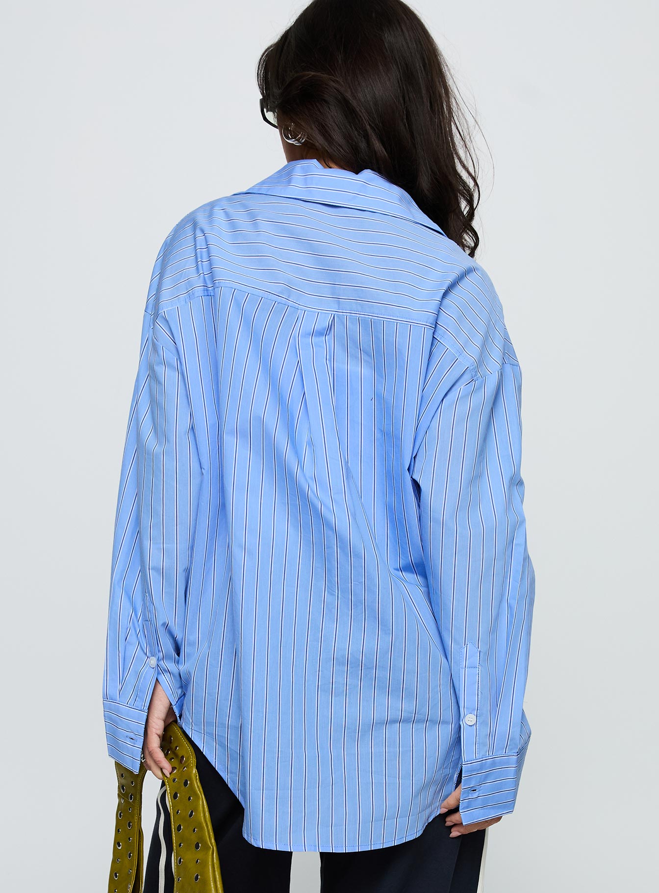 back view of model wearing Princess Polly Kodhi Oversized Long Sleeve Top Blue Stripe Full Sleeves V-Neck 