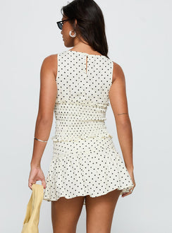 back view of model wearing Princess Polly Tovie Frill Linen Blend Skort Cream Polka Low Rise Shorts 