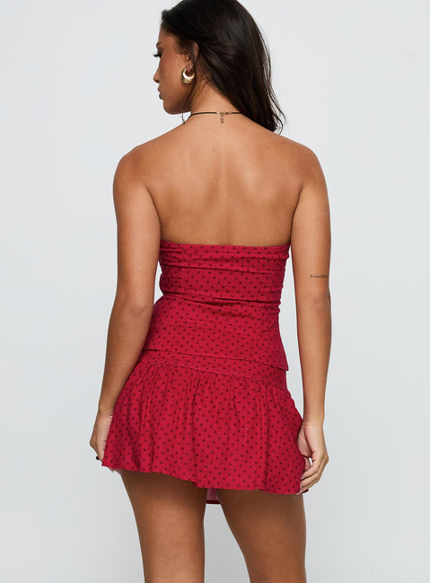 back view of model wearing Princess Polly Tovie Frill Linen Blend Skort Red Polka Low Rise Shorts 