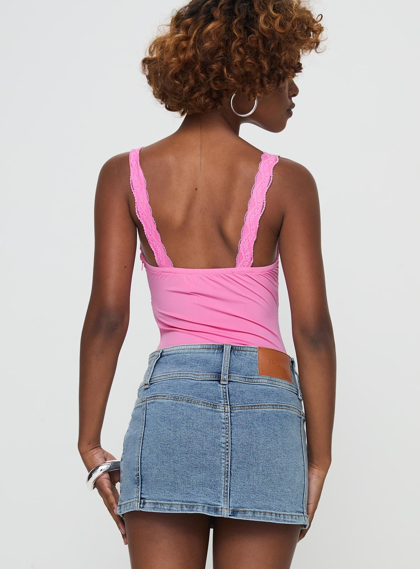 back view of model wearing Princess Polly Girlz Bodysuit Pink Sleeveless V-Neck 