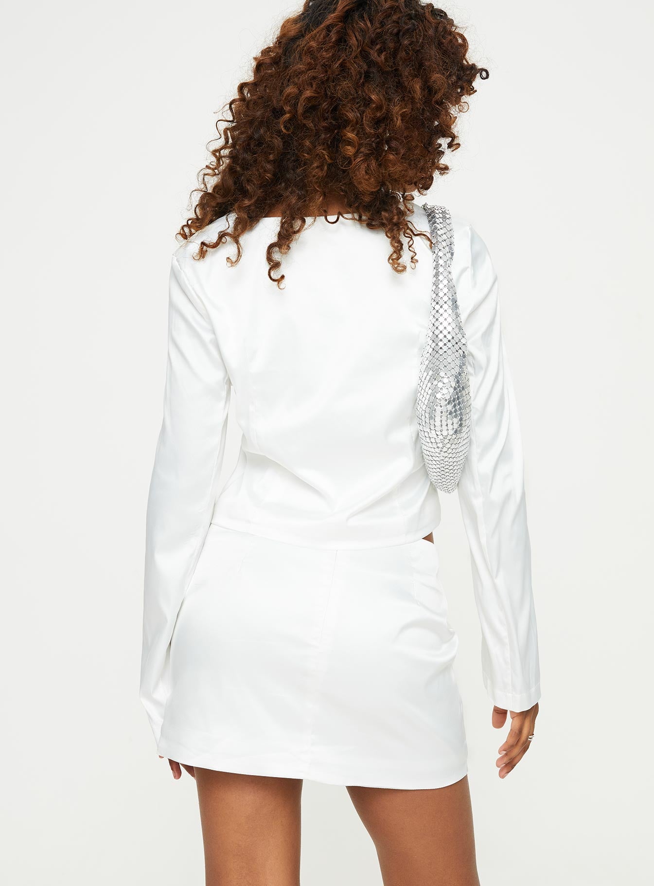 Matching set, silky material Long sleeve top, V neckline, open front Mini skirt, high rise, invisible zip fastening