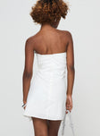 Strapless mini dress Boning throughout, invisible zip fastening at back, pleats at bust Non-stretch material, fully lined